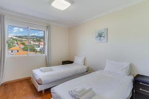 Ένα ή περισσότερα κρεβάτια σε δωμάτιο στο Boeiro I