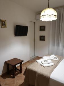 Postel nebo postele na pokoji v ubytování Kalimaka Bed & Breakfast