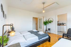 Posteľ alebo postele v izbe v ubytovaní New with a View - Modern Studio