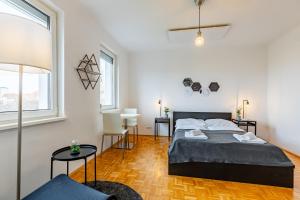 Posteľ alebo postele v izbe v ubytovaní New with a View - Modern Studio