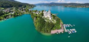 an island in the middle of a large body of water at Schöne große 90 m² Ferienwohung in Zweikirchen 