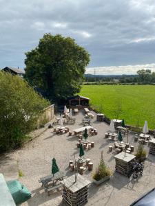 an aerial view of a patio with tables and chairs at The Derby Arms in Grange Over Sands