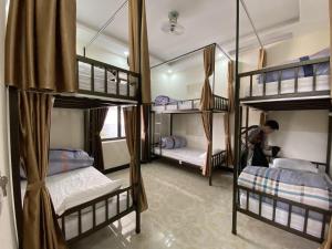 Giường tầng trong phòng chung tại Ha Giang Ali Hostel