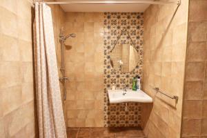 Ένα μπάνιο στο Apartahotel Belchite
