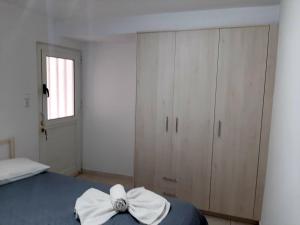 Postel nebo postele na pokoji v ubytování Sitia Holidays 2