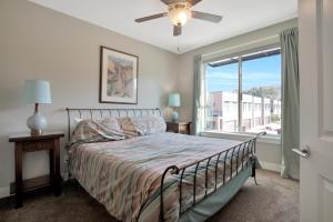 a bedroom with a bed and a window at Entrada at Moab 598 and 602 in Moab +69 photos