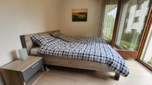 Postel nebo postele na pokoji v ubytování Schöne Ferienwohnung in Traumlage FeWo SoloHike + 19 fotografií