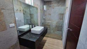 Koupelna v ubytování Hotel Cayuga