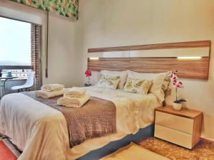 Rúm í herbergi á Panorama Córdoba Center, baño privado externo a la habitación