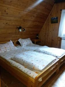 Postel nebo postele na pokoji v ubytování Vikendica Vedran Jahorina