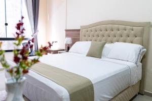 Lova arba lovos apgyvendinimo įstaigoje Liebling Hotel Ciudad del Este