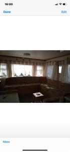 a picture of a living room with a couch at i13 the chase caravan park in Ingoldmells