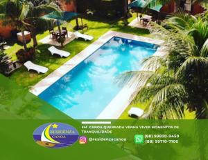 a catalogue of a swimming pool in a resort at Residenza Canoa in Canoa Quebrada