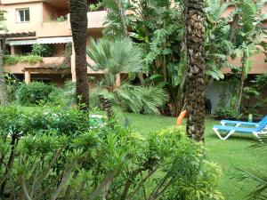 Vonkajšia záhrada v ubytovaní Apartment Jardines