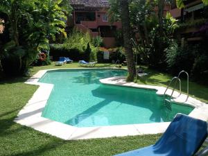 Bazén v ubytovaní Apartment Jardines alebo v jeho blízkosti
