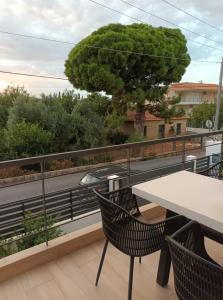 A balcony or terrace at Two Olive Trees - Deluxe Apartments