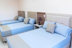 Lova arba lovos apgyvendinimo įstaigoje Liebling Hotel Ciudad del Este