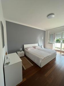 Posteľ alebo postele v izbe v ubytovaní Apartman Kata