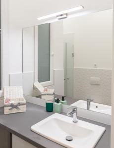 A bathroom at A37 Awesome Apartments