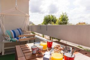 Un balcón o terraza de Super appartement avec vue sur la Tour Eiffel