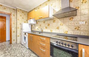 A kitchen or kitchenette at Beautiful Apartment In Camarena De La Sierra With Wifi And 2 Bedrooms