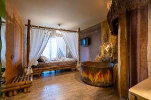 A bed or beds in a room at Posada la Leyenda