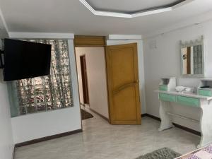 TV a/nebo společenská místnost v ubytování Hotel Alcatraz