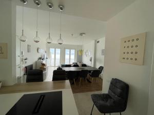 Posedenie v ubytovaní Lake View Casa di Sandra Apartment + 37 fotografií