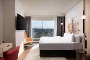 Televiisor ja/või meelelahutuskeskus majutusasutuses Radisson Blu Hotel, Cluj