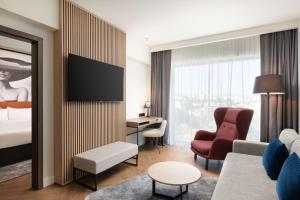 Televiisor ja/või meelelahutuskeskus majutusasutuses Radisson Blu Hotel, Cluj