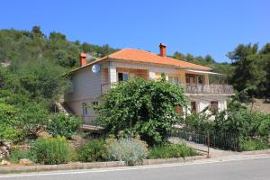 an old house on the side of the road at Apartments by the sea Zaglav, Dugi otok - 8146 in Zaglav