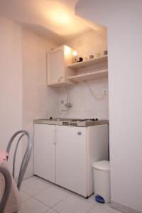 Kuchyň nebo kuchyňský kout v ubytování Apartments with parking spaces Vis - 2476