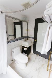 Koupelna v ubytování Hotel Richland LES