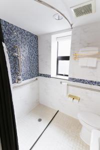 Koupelna v ubytování Hotel Richland LES