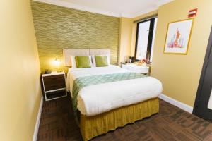 Postel nebo postele na pokoji v ubytování Hotel Richland LES