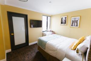 Postel nebo postele na pokoji v ubytování Hotel Richland LES