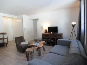 Telewizja i/lub zestaw kina domowego w obiekcie Appartement 3 pièces pour 6 personnes à 350m des pistes – Résidence Petite Ourse, Flaine Forêt - FR-1-687-16