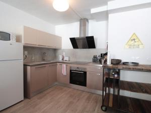 Kuchnia lub aneks kuchenny w obiekcie Appartement 3 pièces pour 6 personnes à 350m des pistes – Résidence Petite Ourse, Flaine Forêt - FR-1-687-16