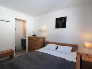 Łóżko lub łóżka w pokoju w obiekcie Appartement 3 pièces pour 6 personnes à 350m des pistes – Résidence Petite Ourse, Flaine Forêt - FR-1-687-16