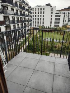 Fotografia z galérie ubytovania Uroczy apartament z miejscem na auto w garażu vo Varšave