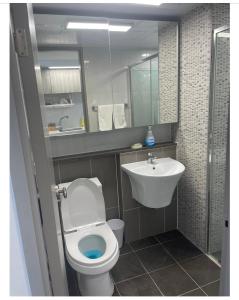 a bathroom with a toilet and a sink at Yeongjongdo high floor Ocean View in Incheon
