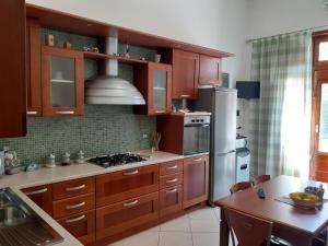 Kuchyň nebo kuchyňský kout v ubytování O'Paisi Casa Vacanze