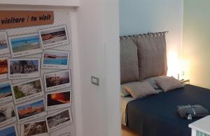 Postel nebo postele na pokoji v ubytování O'Paisi Casa Vacanze