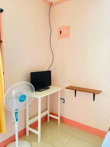 TV a/nebo společenská místnost v ubytování Uptown Guesthouse + 36 fotografií