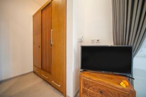 Μια τηλεόραση ή/και κέντρο ψυχαγωγίας στο Umaliplip Villa Canggu