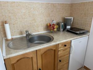 Kuchyň nebo kuchyňský kout v ubytování Willa Edi + 86 fotografií