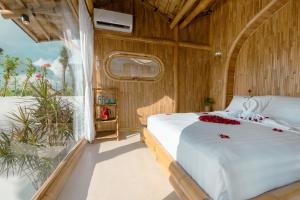 Postel nebo postele na pokoji v ubytování Skyspace Villas Bali + 37 fotografií