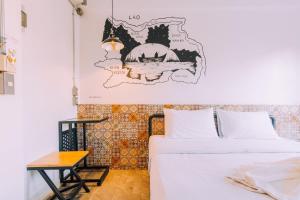 Postel nebo postele na pokoji v ubytování V1 Room Hotel