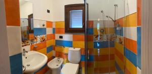 Vannituba majutusasutuses Hotel Al Togo Fitness & Relax