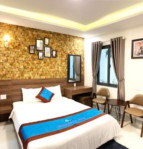 Postelja oz. postelje v sobi nastanitve DALAT STREAM HOTEL-Khách sạn đẹp Đà Lạt